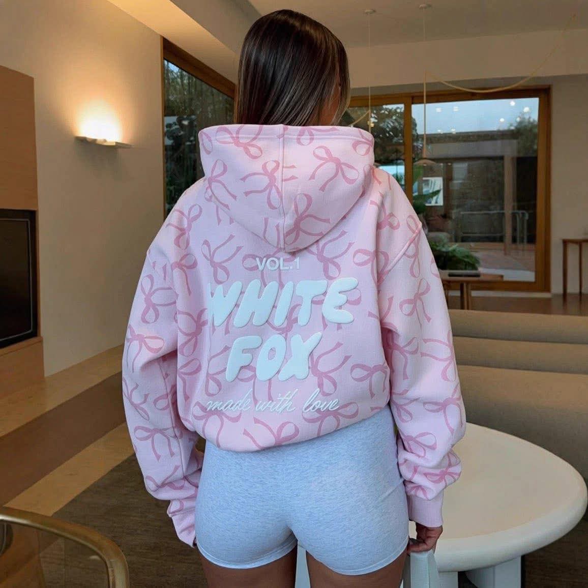 WF Bow/print sweater (in stock)